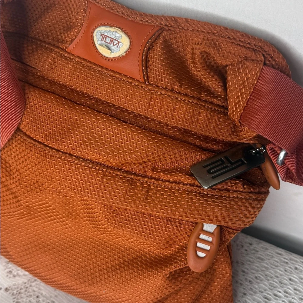 Tumi orange multiple zipper crossbody bag - Picture 4 of 10